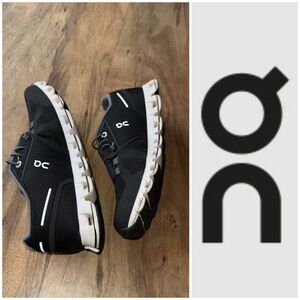 On Running Black and Gray Athletic Shoes with Streamlined Design
